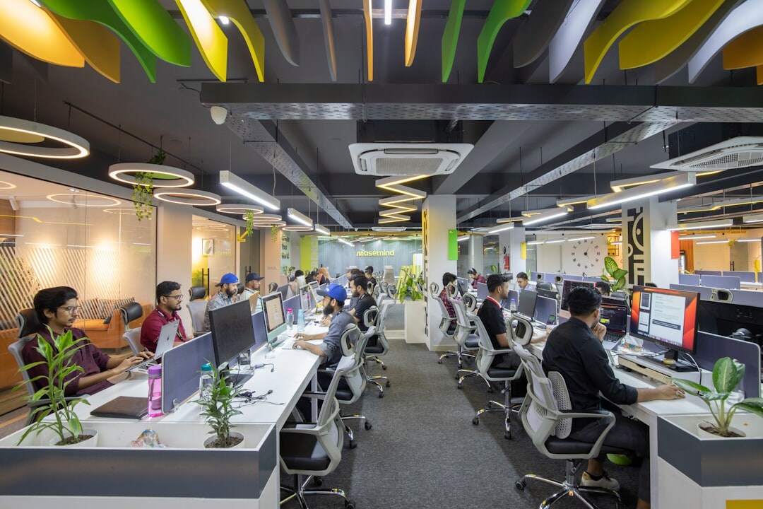 Modern open-plan office with employees working