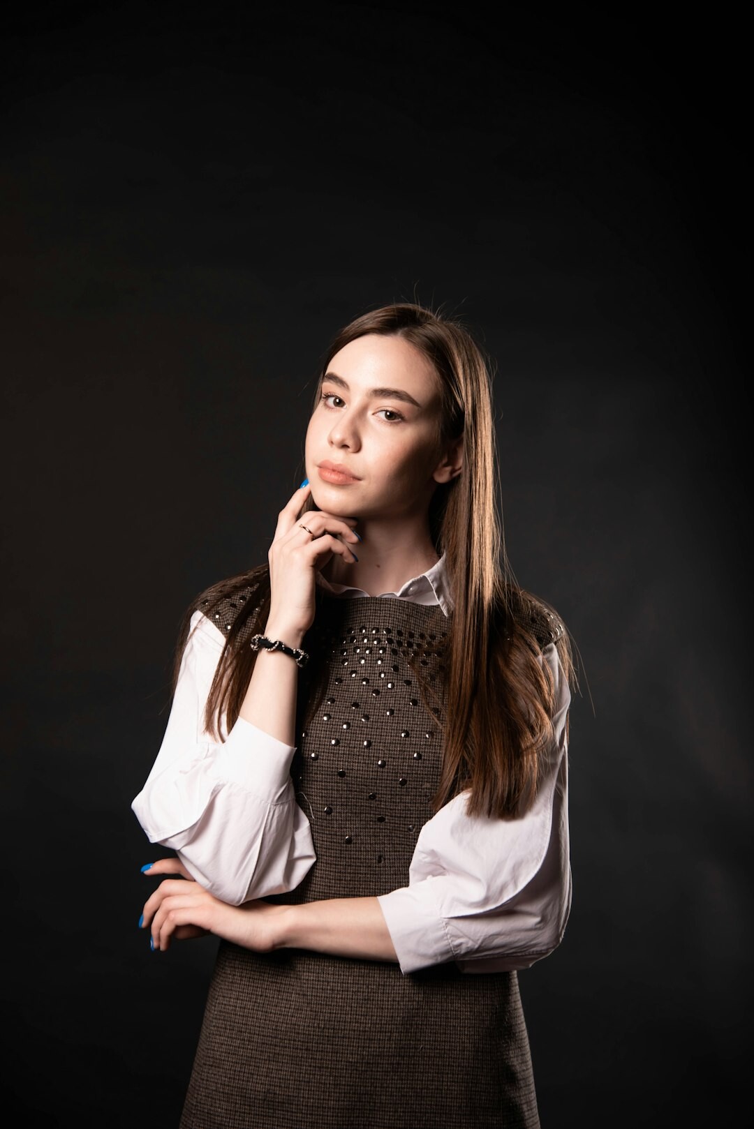 Studio portrait of a young European woman analyst